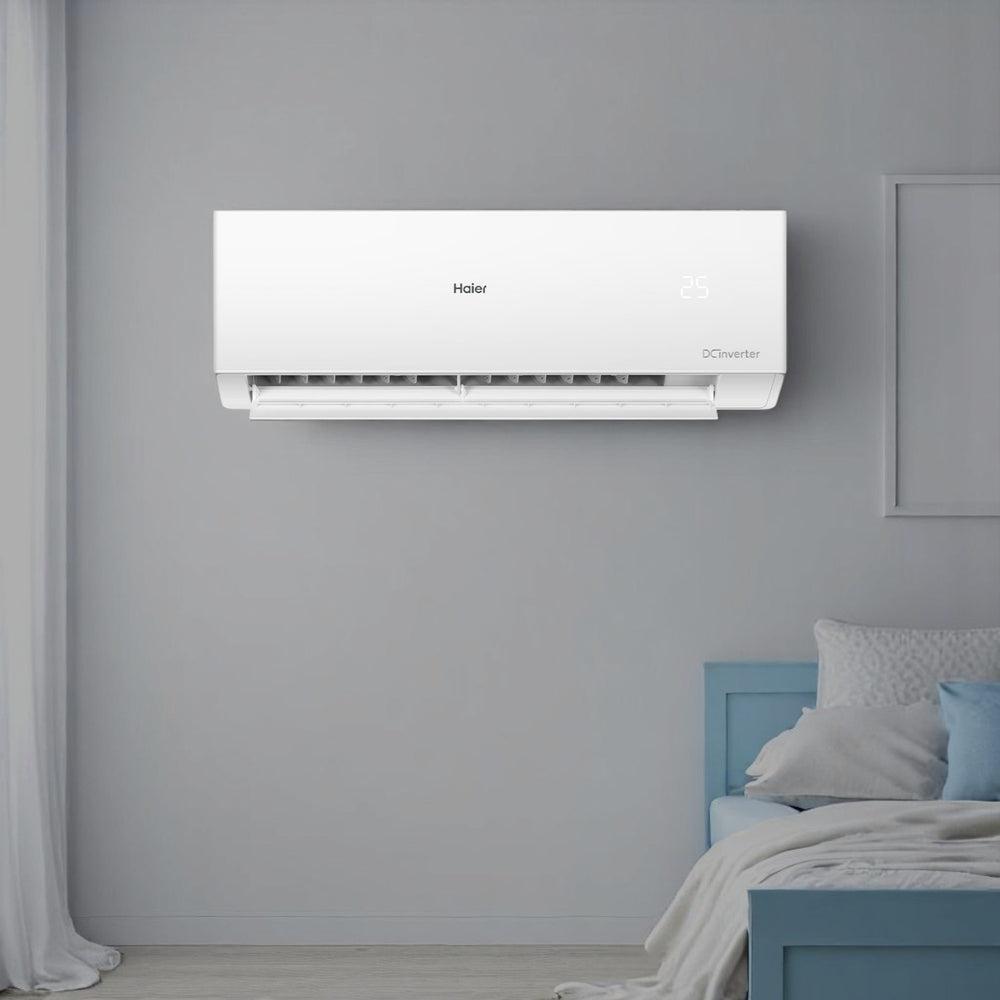 Haier Clean Cool 1.5 Ton DC inverter split type air conditioner unit in white featuring a sleek modern design and a hidden temperature display.