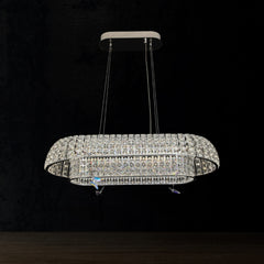Qulik Allure crystal chandelier with layered oval crystal frame, silver finish and suspended pendant design.