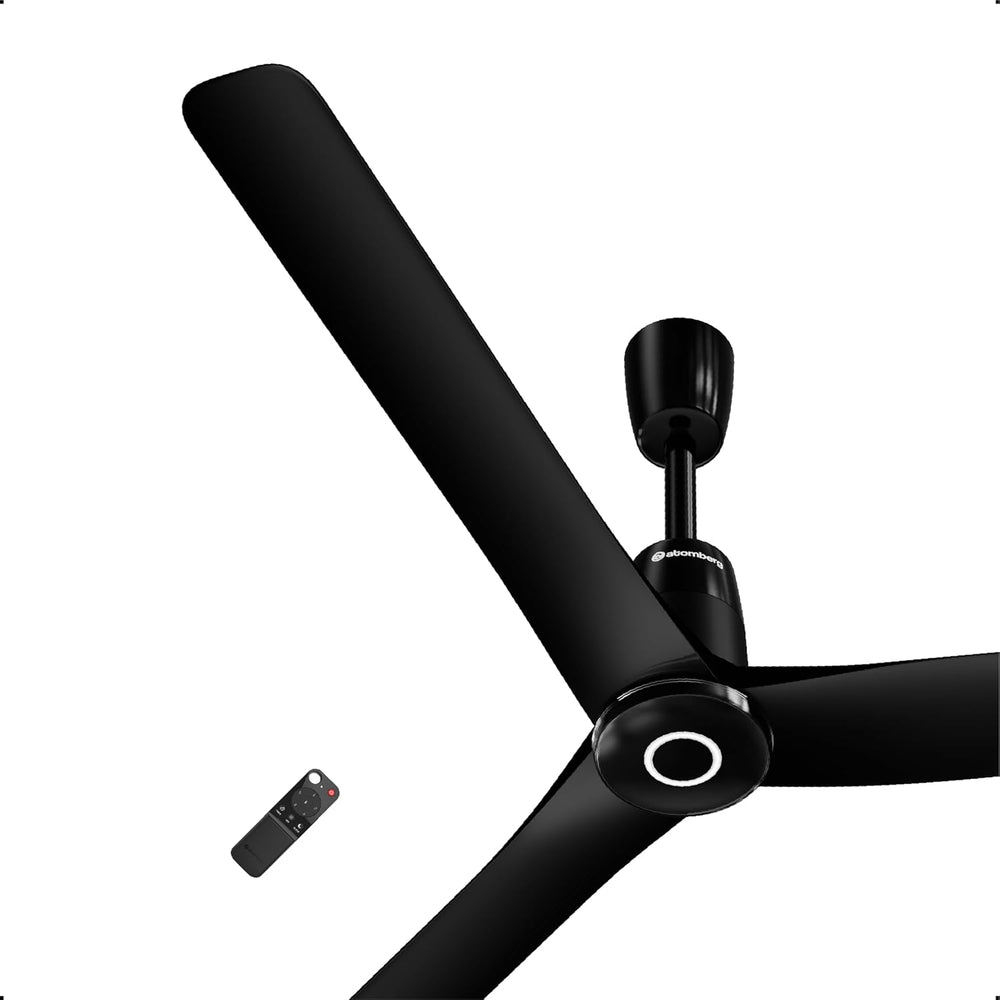 Atomberg Aris Contour Smart 48 inch BLDC ceiling fan in Midnight Black with remote control, isolated on a white background.