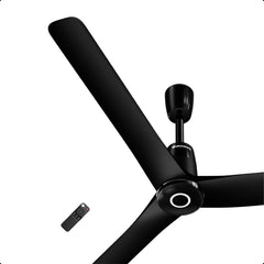 Atomberg Aris Contour Smart 48 inch BLDC ceiling fan in Midnight Black with remote control, isolated on a white background.