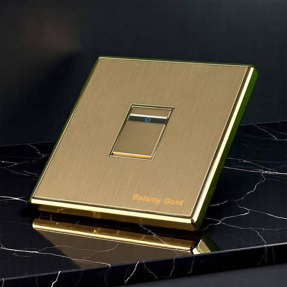 Belamy Gold 1 gang 2 way switch with brushed gold finish, slim rocker design and power indicator, model BE-138-SW.