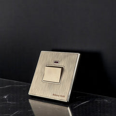 Belamy Gold 20A DP switch with LED indicator and brushed gold finish, model BE-144-SW.