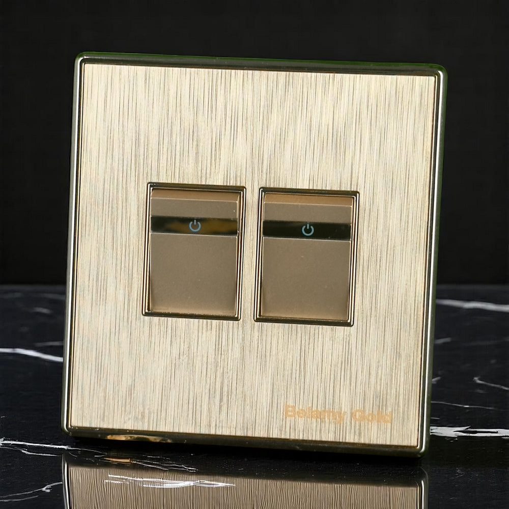 Belamy Gold 2 gang 1 way switch with dual rocker controls, power indicators and brushed gold finish, model BE-134-SW.