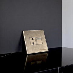 Belamy Gold 2 pin socket with separate rocker switch, power indicator and brushed gold finish, model BE-137-SW.