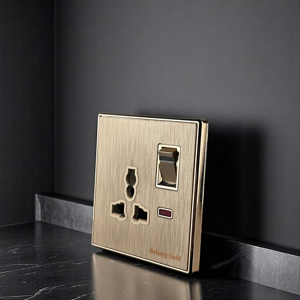 Belamy Gold 3-pin socket with separate rocker switch, LED indicator and brushed gold finish, model BE-142-SW.