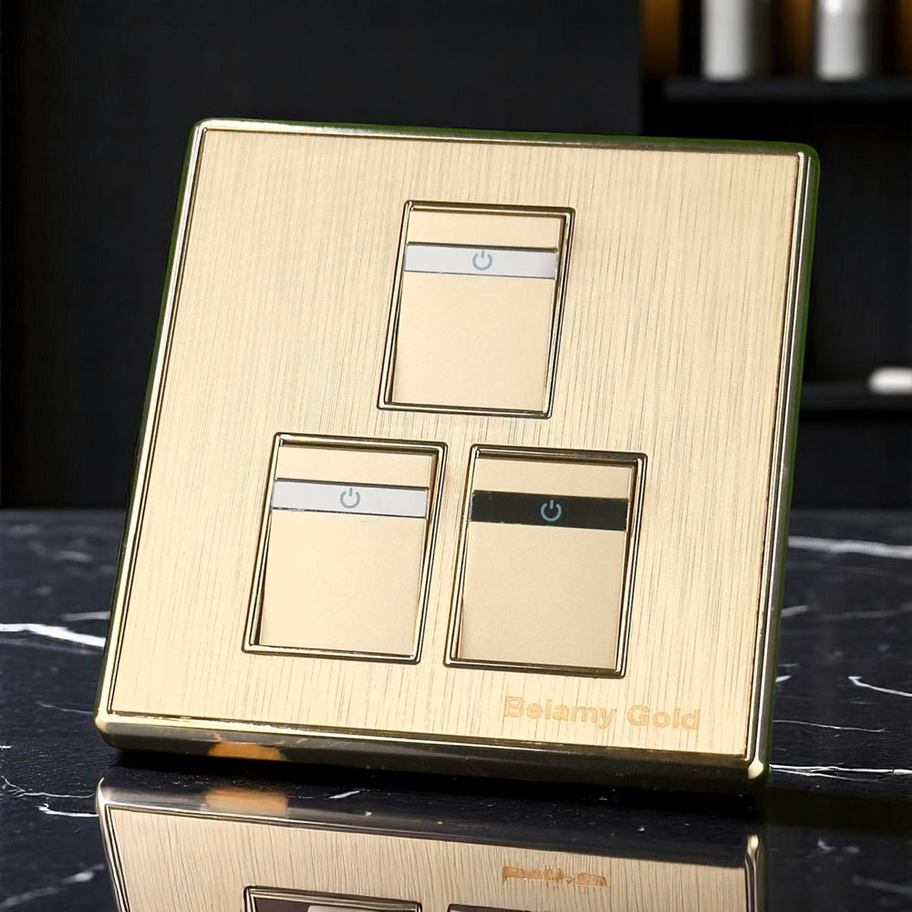 Belamy Gold 3 gang 1 way switch with three rocker controls, power indicator strips and brushed gold finish, model BE-135-SW.