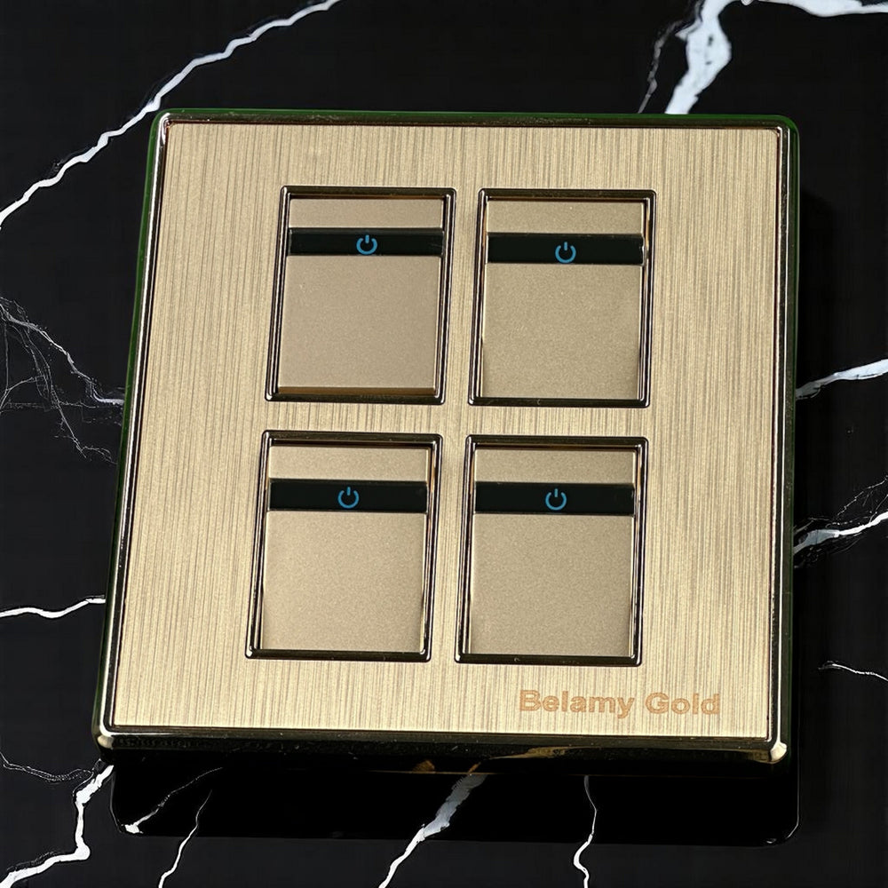 Belamy Gold 4 gang 1 way switch with four rocker controls, blue power indicators and brushed gold finish, model BE-136-SW.