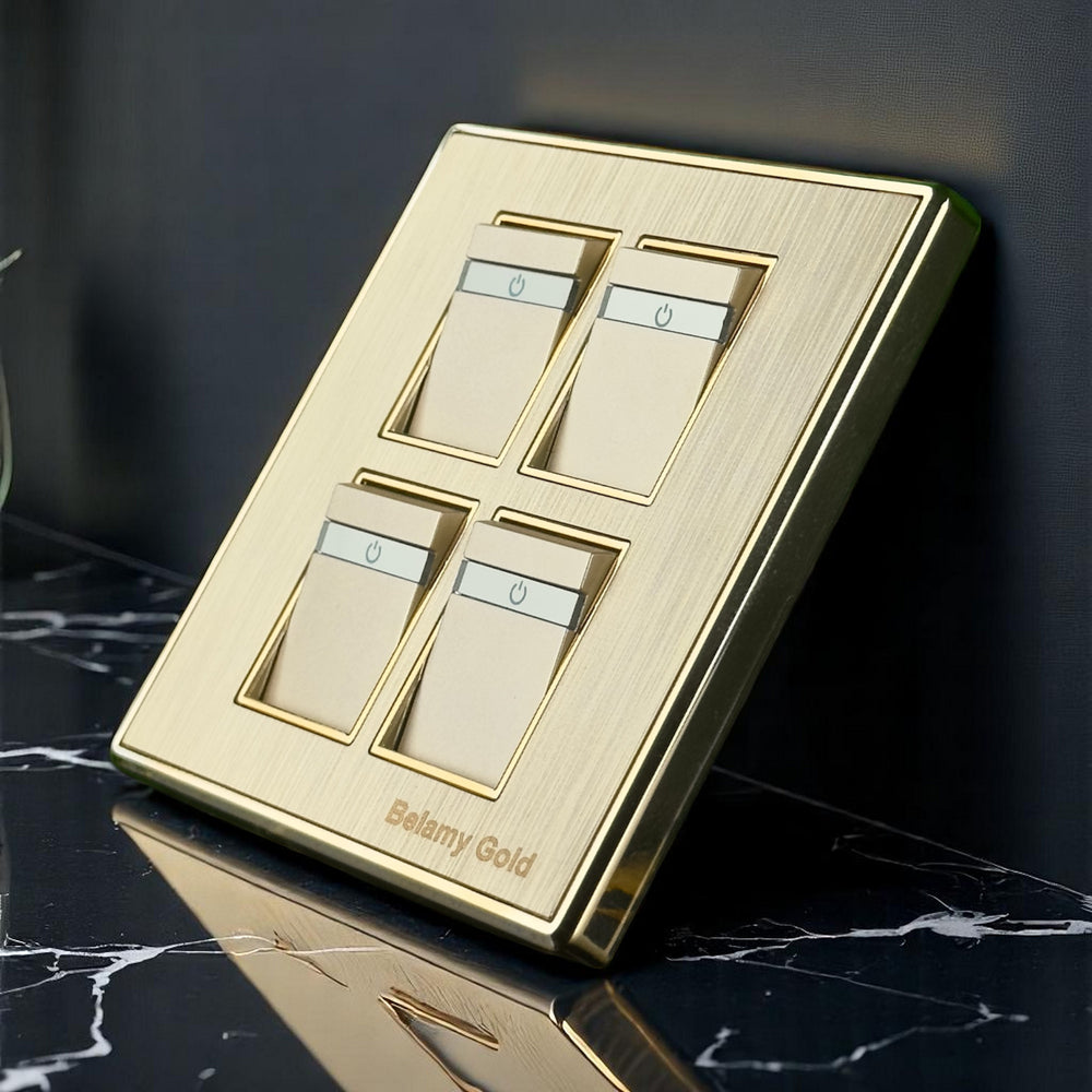 Belamy Gold 4 gang 1 way switch with four rocker controls, power indicators and brushed gold finish, model BE-136-SW.
