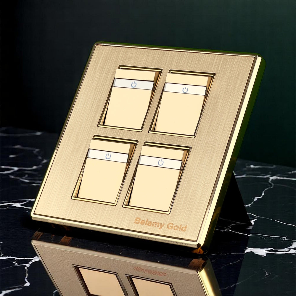 Belamy Gold 4 gang 1 way switch with four rocker controls, power indicator strips and brushed gold finish, model BE-136-SW.
