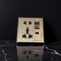 Belamy Gold multi 5-pin socket with rocker switch, LED indicator and brushed gold finish, model BE-141-SW.
