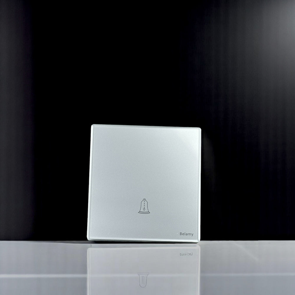 Belamy sky grey push bell switch with bell icon and sleek minimalist wall plate, model BE-112-SW.