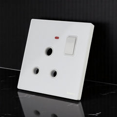 Belamy white 1 gang 3-pin round socket with rocker switch and red indicator light, model BE-151-SW.