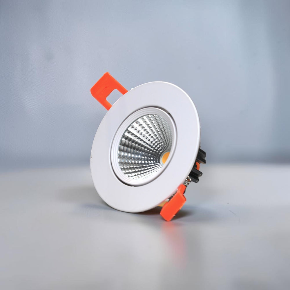 Energy Plus 6092 5W LED concealed spot light with a white circular frame, textured silver reflector and orange spring mounting clips.