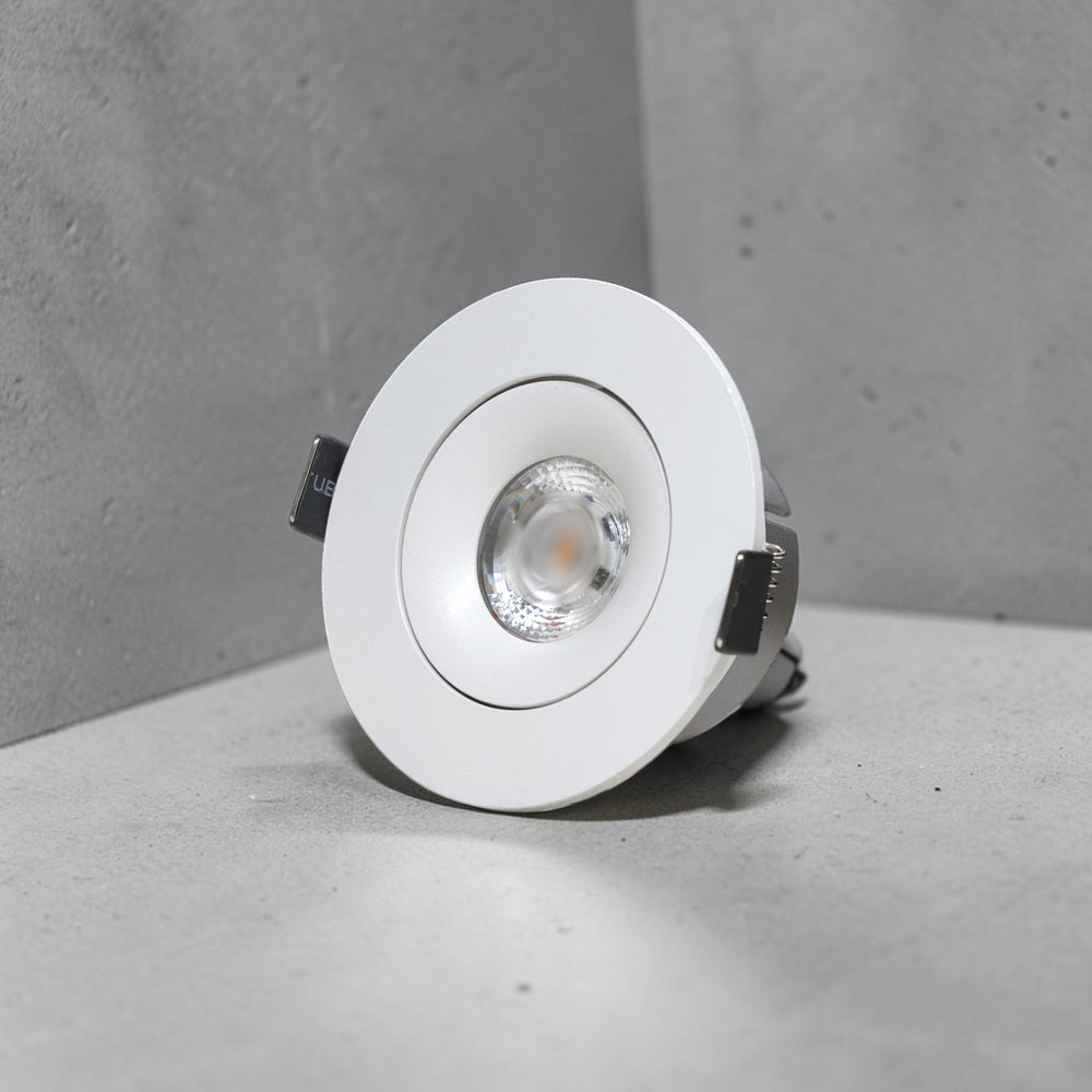 Energy Plus 6113 7W LED concealed spot light with a white circular frame, recessed lens and metal spring mounting clips.