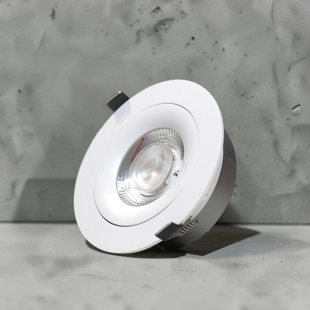 Energy Plus 6115 18W LED concealed spot light with a white circular frame, clear central lens, silver reflector and spring mounting clips.