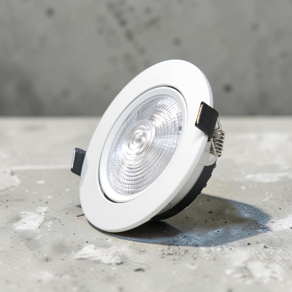 Energy Plus CS6119 10W LED concealed spot light featuring a white circular frame, clear faceted lens, and spring clips.