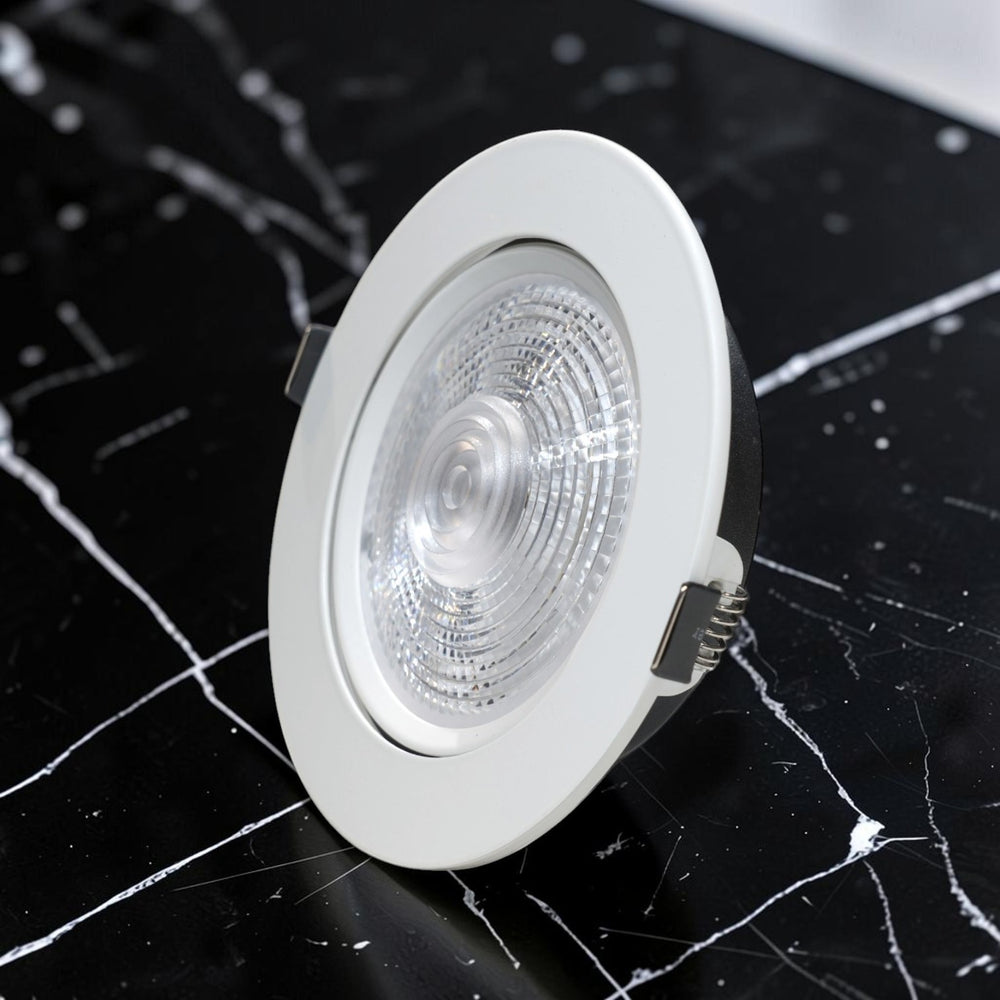 Energy Plus 6120 20W LED concealed spot light with a white circular frame, clear textured lens and metal spring mounting clips.