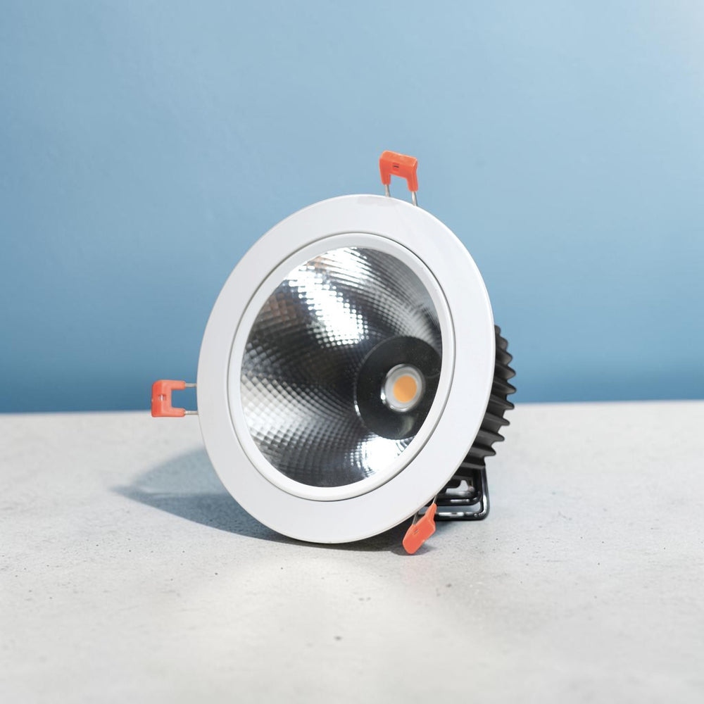 Energy Plus 6133 36W LED concealed spot light with a white circular trim, textured silver reflector and black cooling fins.