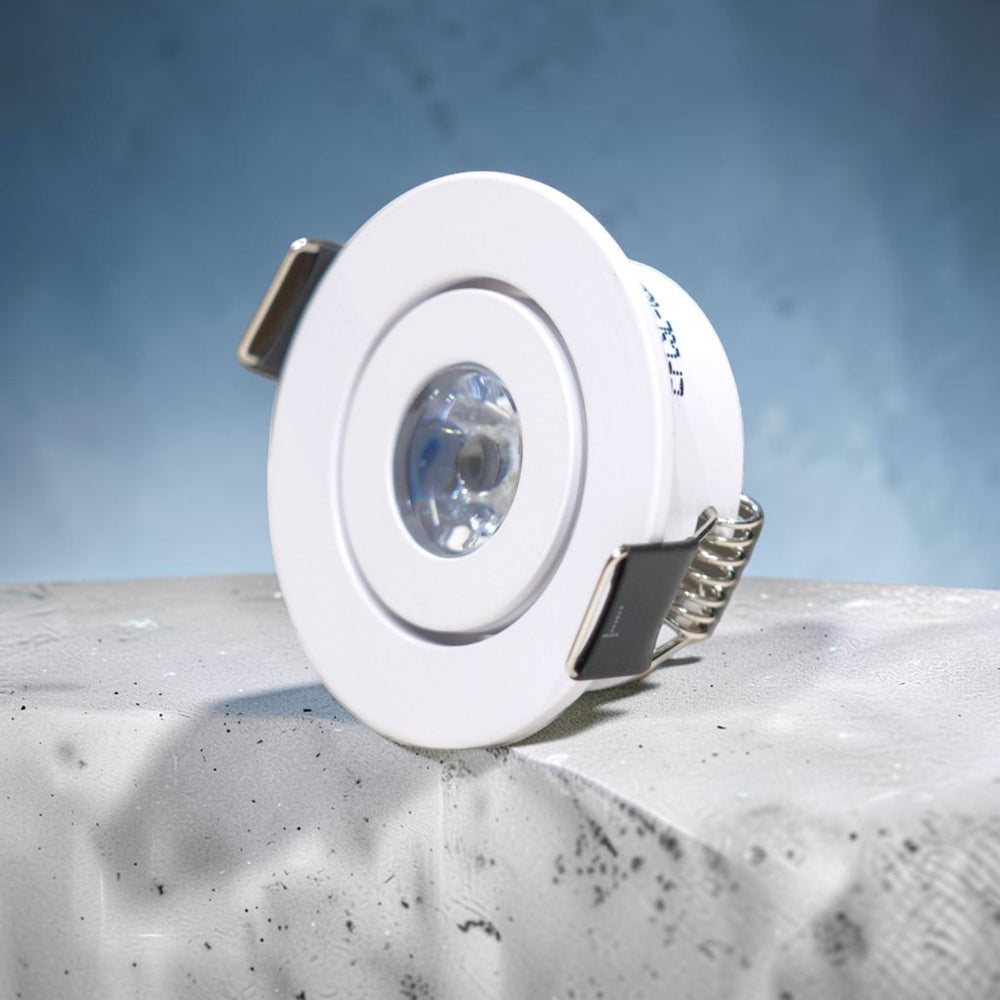 Energy Plus 6137 1W LED concealed spot light with a white circular frame, clear central lens and metal spring mounting clips.