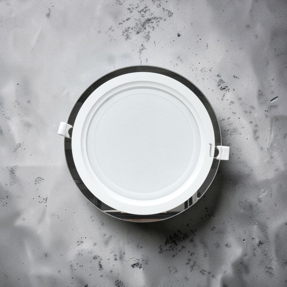 Energy Plus Cozy Panel 2018 18W round panel light in white with polished silver rim, frosted diffuser and mounting clips, model CP701.