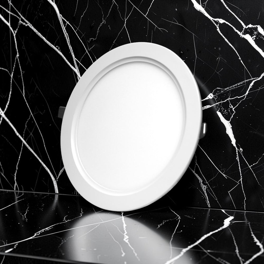 Energy Plus Zion Panel 2017 18W round panel light in white with slim circular frame and frosted diffuser, model Z1031.