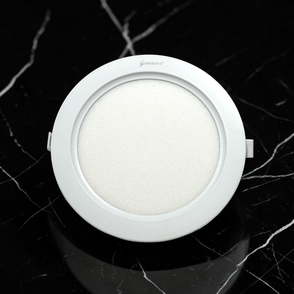 Energy Plus Zion Panel 2017 18W round panel light in white with circular frame and textured frosted diffuser, model Z1039.