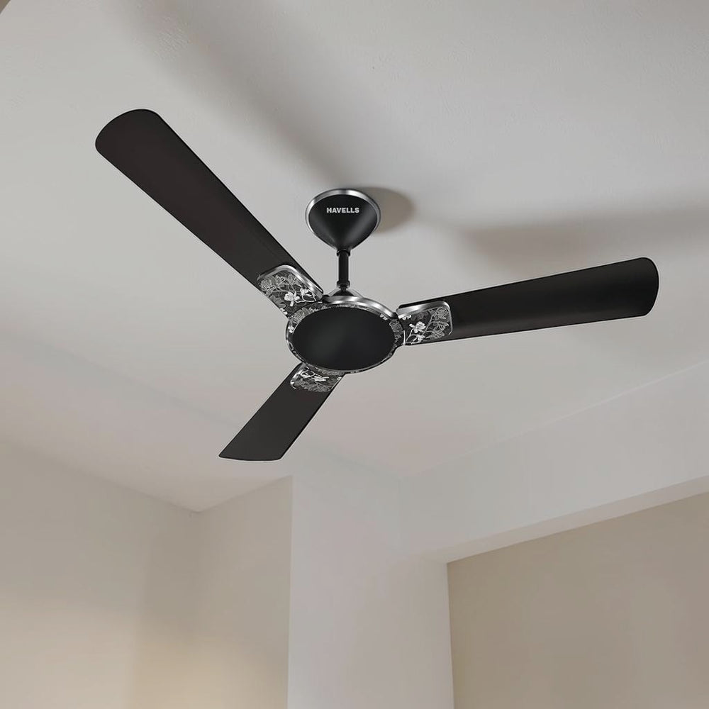 Havells Enticer Art 56-inch black ceiling fan with 3 blades and decorative silver floral accents, model H-217.