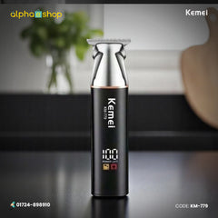 Kemei KM-779 black-silver hair clipper and beard trimmer with T-blade and digital power display.