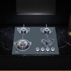 Midea Fuoco Forte 60GE503 24-inch four-burner gas stove in black finish. Available at Alphaeshop.