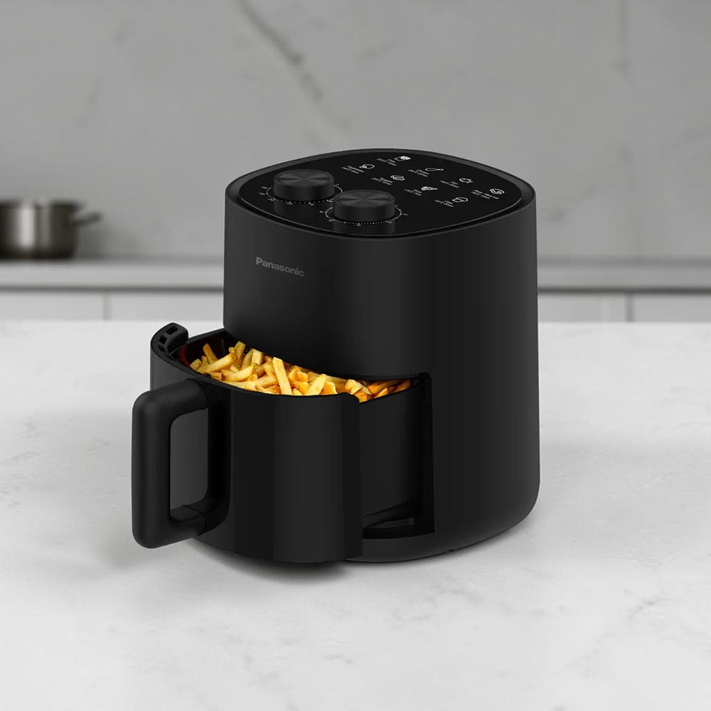 Panasonic NF-CC450KUA 4.5L black air fryer with dual control dials and pull-out cooking basket.