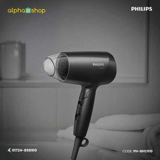 Philips BHC010/12 Essential Care 1200W black hair dryer with concentrator nozzle and multiple airflow settings.