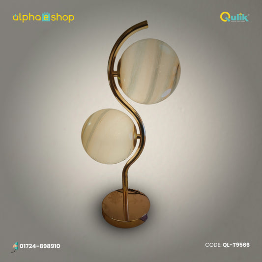 Qulik twin globe table lamp with curved gold frame, two beige marble-look globes and round gold base, model QL-T9566.