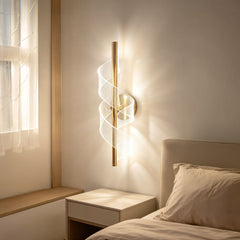 Qulik modern wall light with gold vertical rod and illuminated twisted ribbon design for decorative indoor lighting.
