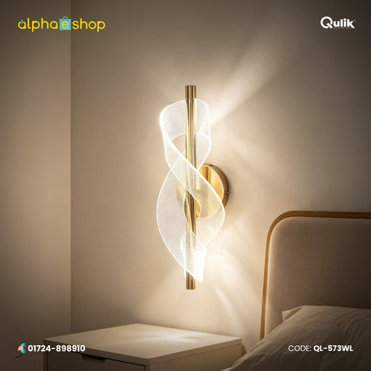 Qulik modern wall light with gold finish, vertical rod and illuminated twisted ribbon design for decorative indoor lighting.