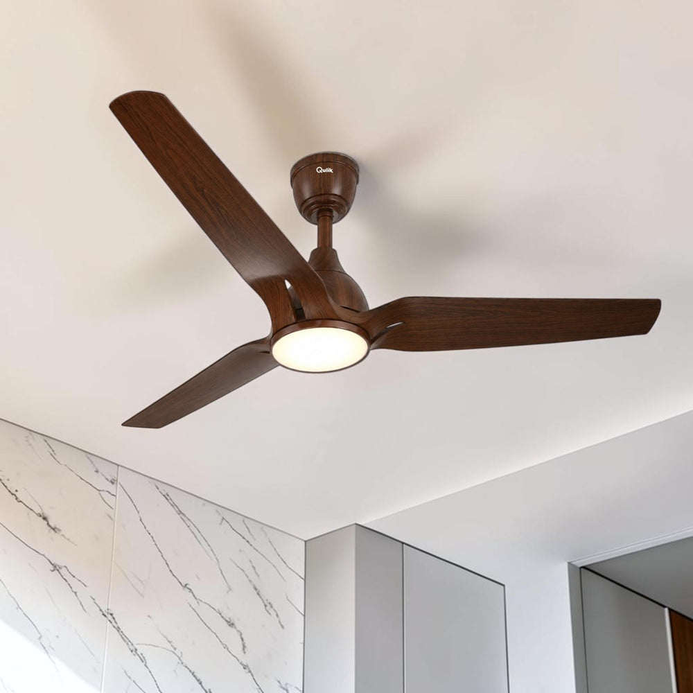 Qulik Nexa 56-inch dark wood BLDC ceiling fan with 3 ABS blades, LED underlight, remote control, silent operation and energy saving.