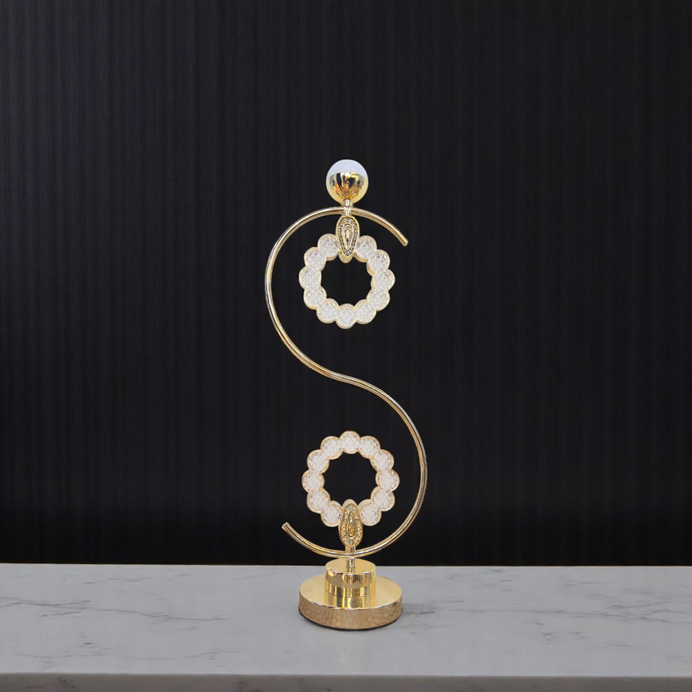 Qulik S-shaped floral LED table lamp with gold finish and twin crystal flower rings, model QL-LT8600-2.