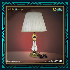 Qulik traditional table lamp with clear crystal body, polished gold accents and pleated white fabric shade, model QL-LT1922.