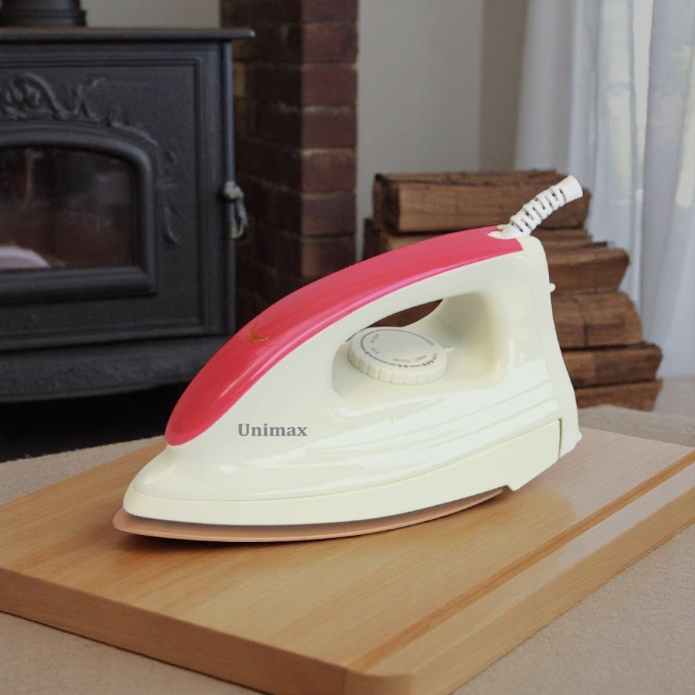 Unimax UDDI-16R Deluxe dry iron in cream and red with temperature control dial, ergonomic handle and smooth soleplate.